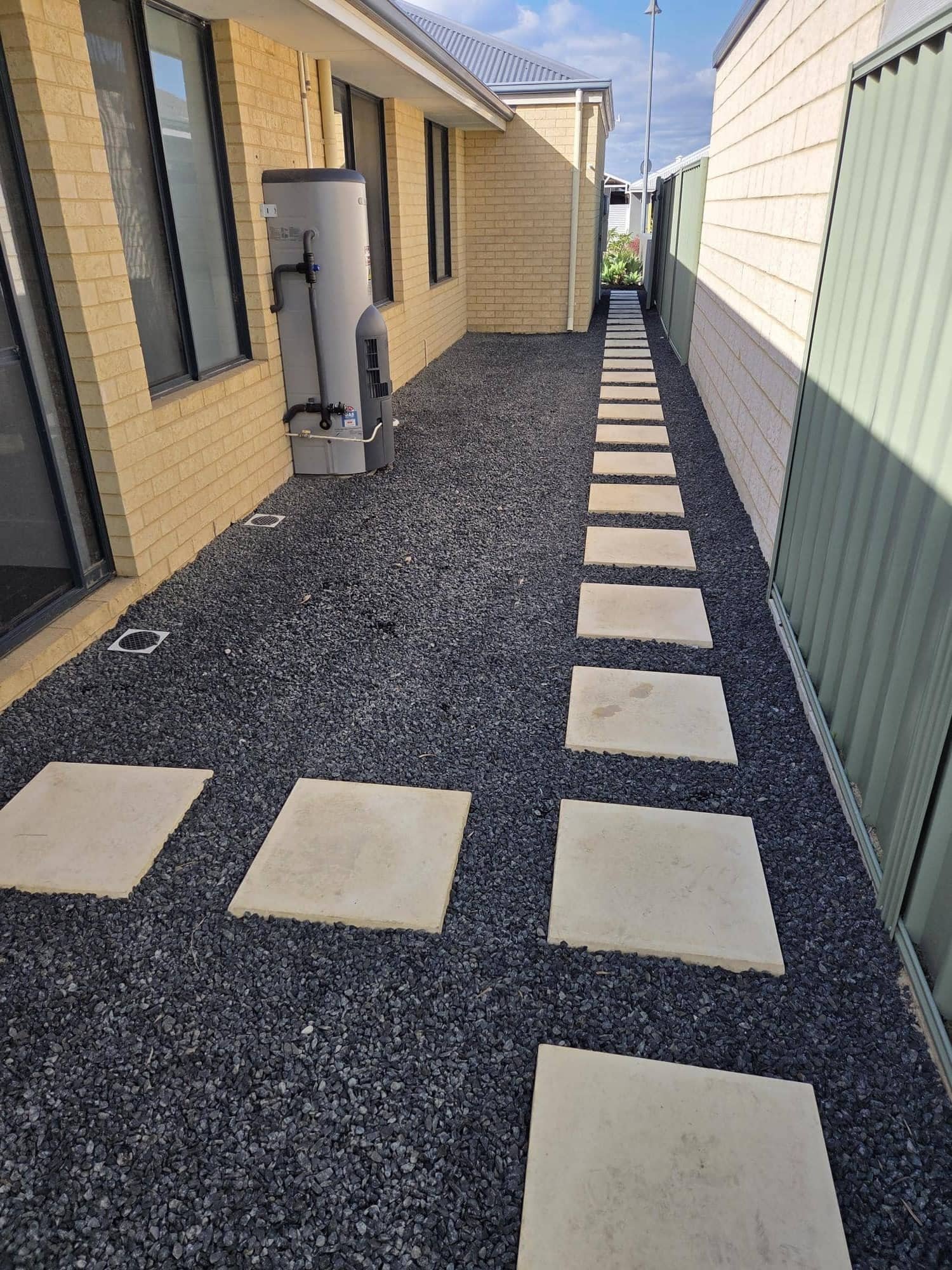 Side path with gravel and stepping stones